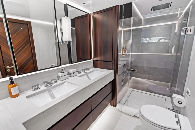 Don Tortuga Yacht Photos Pics Luxurious bathroom in 2024 Sunseeker 90 Ocean yacht, featuring modern fixtures and elegant design.