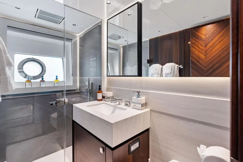 Don Tortuga Yacht Photos Pics Luxurious bathroom interior of 2024 Sunseeker 90 Ocean yacht, featuring modern design and elegant finishes.