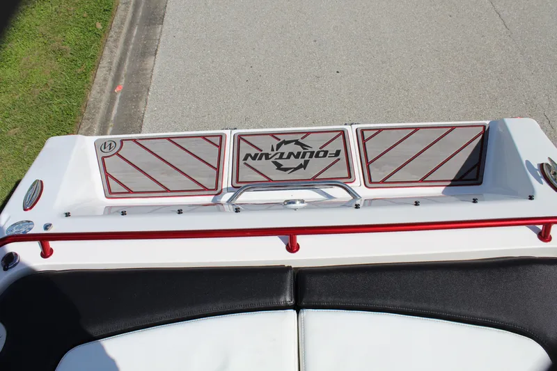 Lightning Yacht Photos Pics 2007 Fountain 42 Lightning boat deck with logo and red accents.