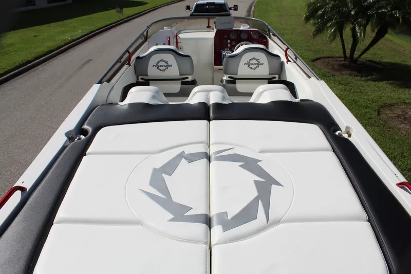 Lightning Yacht Photos Pics 2007 Fountain 42 Lightning boat interior with white seating and logo design.