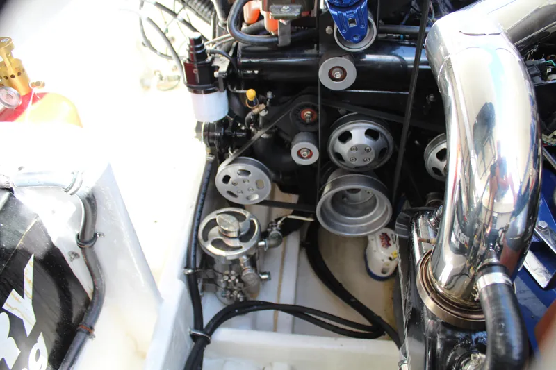 Lightning Yacht Photos Pics 2007 Fountain 42 Lightning engine compartment with visible components and wiring.