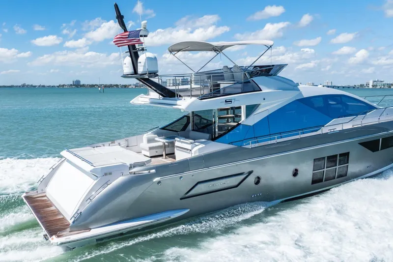 Azimut S7 Yacht Photos Pics Luxurious 2019 Azimut S7 yacht cruising on a sunny day, featuring sleek design and modern amenities.