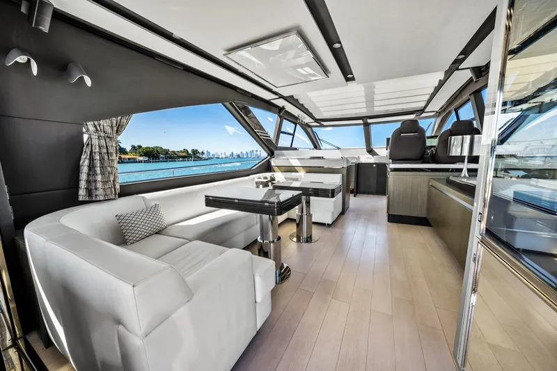 Azimut S7 Yacht Photos Pics Luxurious interior of 2019 Azimut S7 yacht with modern seating and panoramic windows.