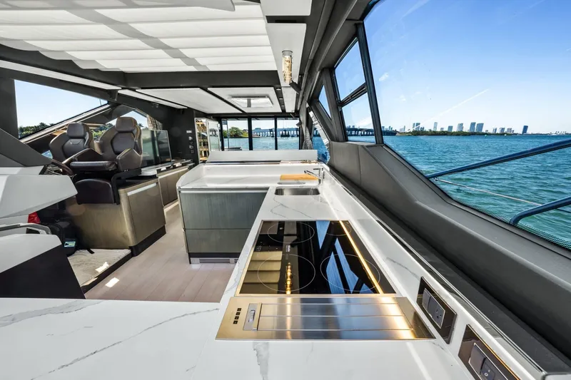 Azimut S7 Yacht Photos Pics Luxurious interior of 2019 Azimut S7 yacht with modern kitchen and scenic ocean view.