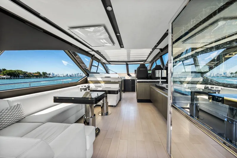 Azimut S7 Yacht Photos Pics Luxurious interior of 2019 Azimut S7 yacht with panoramic windows and modern furnishings.