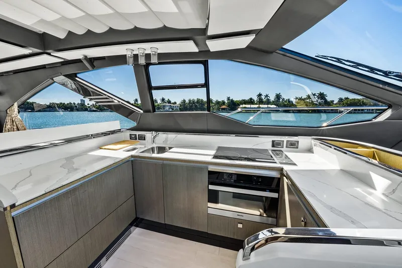 Azimut S7 Yacht Photos Pics Luxurious 2019 Azimut S7 yacht kitchen with modern design and scenic ocean view.