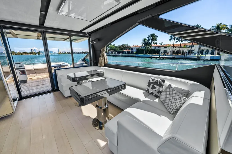 Azimut S7 Yacht Photos Pics Luxurious interior of 2019 Azimut S7 yacht with waterfront view and modern seating.