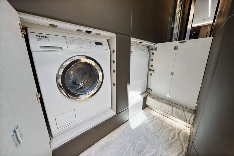 Azimut S7 Yacht Photos Pics Laundry area with Miele washing machine in 2019 Azimut S7 yacht.