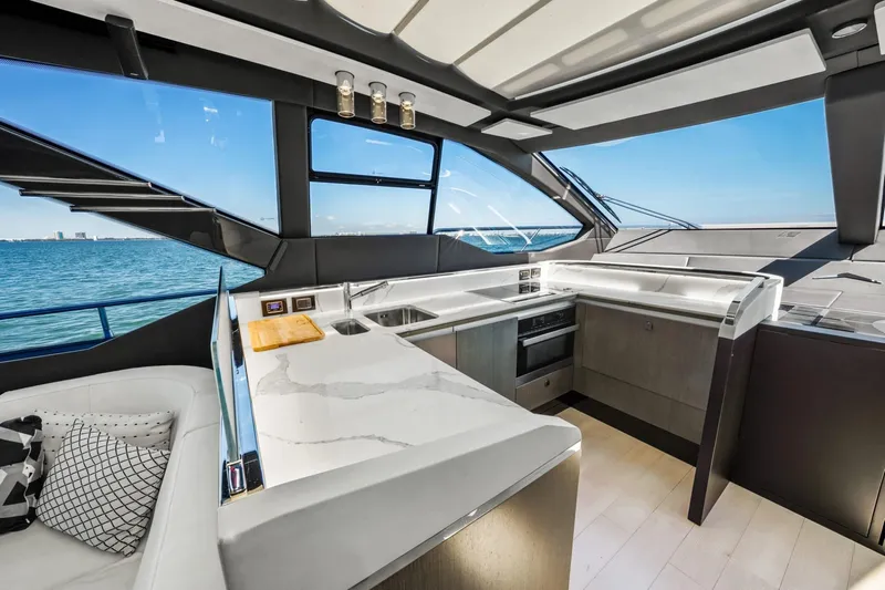 Azimut S7 Yacht Photos Pics Luxurious interior of 2019 Azimut S7 yacht with modern kitchen and ocean view.