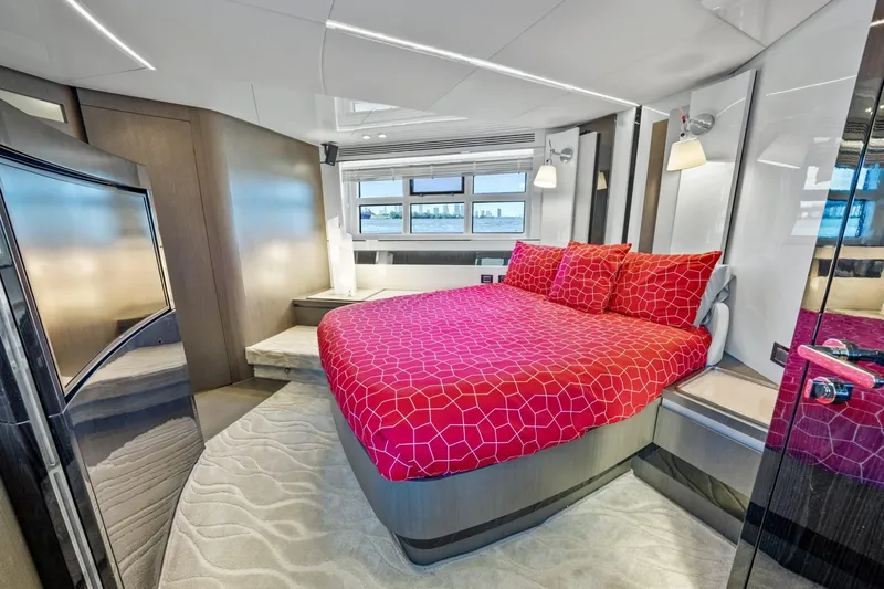 Azimut S7 Yacht Photos Pics Luxurious 2019 Azimut S7 yacht bedroom with red bedding and modern design.
