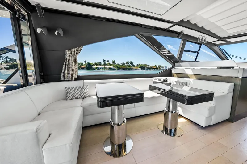 Azimut S7 Yacht Photos Pics Luxurious interior of 2019 Azimut S7 yacht with elegant seating and scenic window view.