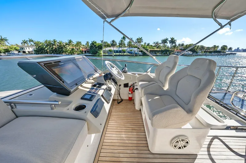 Azimut S7 Yacht Photos Pics 2019 Azimut S7 yacht helm with luxurious seating and advanced navigation system.