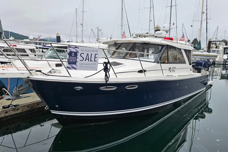  Yacht Photos Pics 2020 Cutwater C-32 C yacht for sale, docked in marina with sale sign.