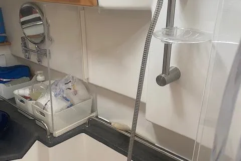  Yacht Photos Pics 2020 Cutwater C-32 C boat interior with shower and storage area.