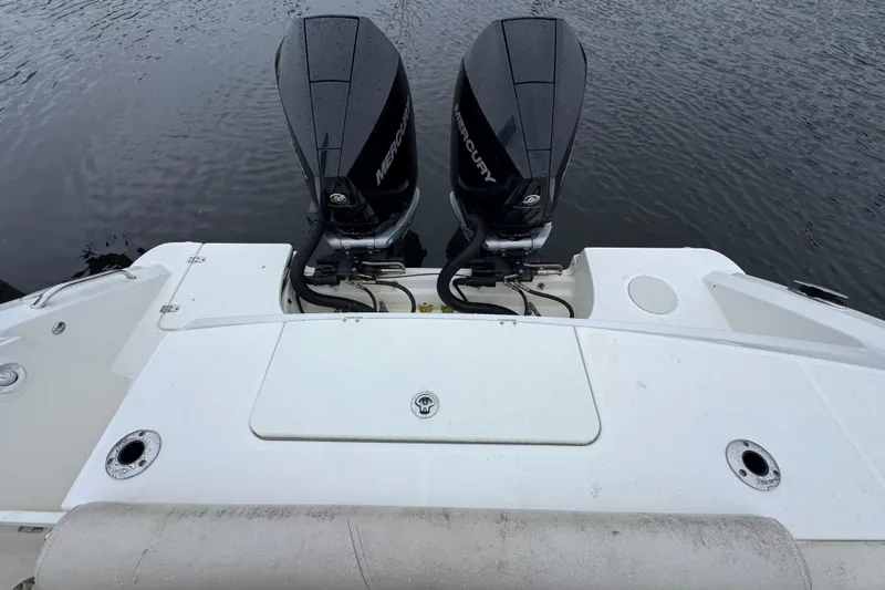  Yacht Photos Pics 2019 Boston Whaler 330 Outrage with dual Mercury outboard engines on water.