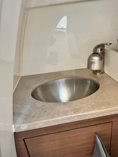  Yacht Photos Pics 2020 Boston Whaler 280 Vantage boat sink with stainless steel basin and modern faucet.