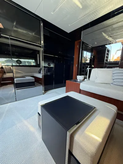 4946 Yacht Photos Pics Luxurious interior of 2023 Riva 56 Rivale yacht with modern furnishings and sleek design.