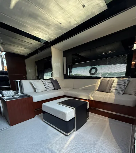 4946 Yacht Photos Pics Luxurious interior of 2023 Riva 56 RIVALE yacht with modern seating and elegant decor.