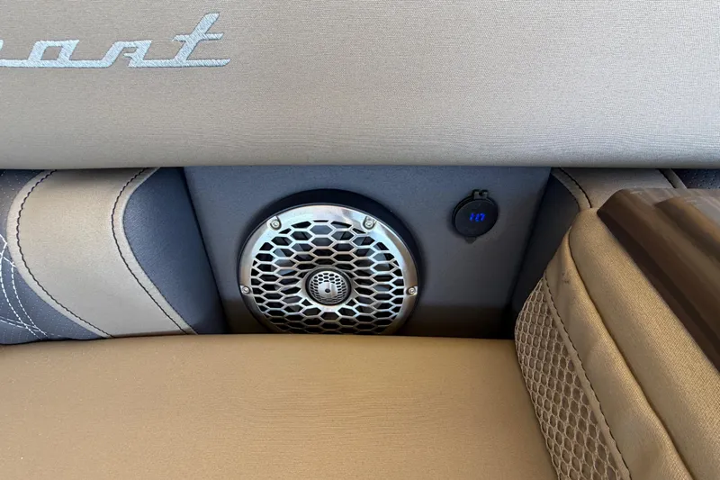  Yacht Photos Pics 2024 Bennington 25 QX Swingback interior with speaker and USB port detail.