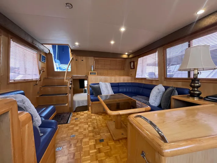 Journey Yacht Photos Pics Luxurious interior of 1999 Ocean Alexander Sundeck 460 yacht with elegant wood finishes.