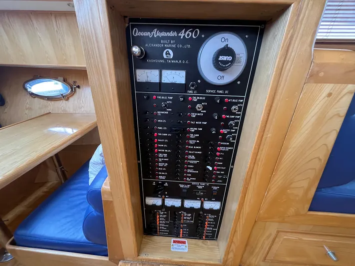 Journey Yacht Photos Pics Electrical panel of 1999 Ocean Alexander Sundeck 460 yacht, featuring control switches and indicators.