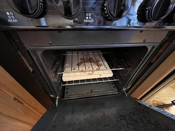 Journey Yacht Photos Pics Open oven with wooden planks inside, Ocean Alexander Sundeck 460, 1999 model.