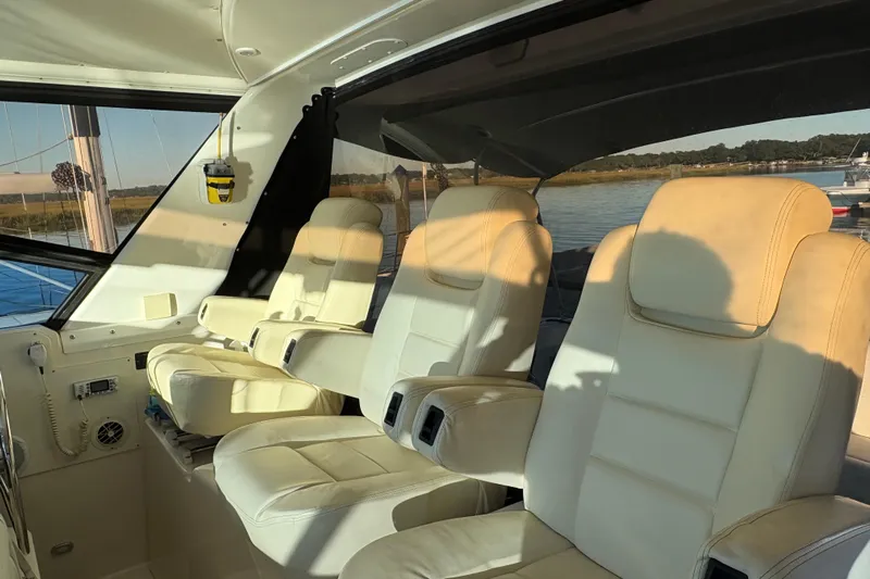  Yacht Photos Pics Interior of 1999 Tiara Yachts 4000 Express with luxurious white seating.