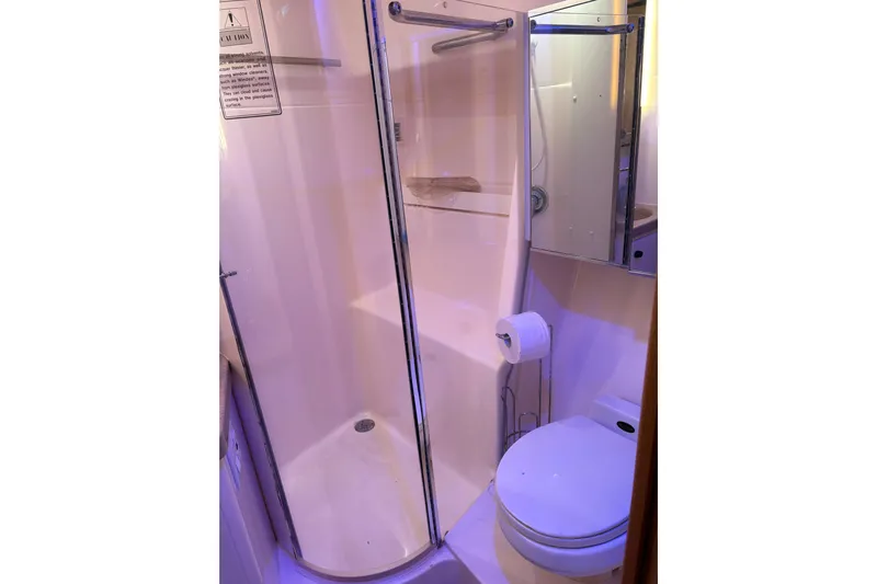  Yacht Photos Pics Bathroom of 1999 Tiara Yachts 4000 Express with shower and toilet.