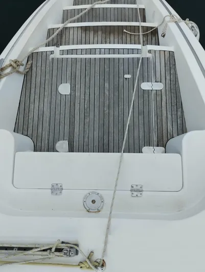  Yacht Photos Pics Deck of 2004 Lagoon 570 yacht with wooden flooring and ropes.