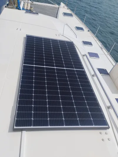  Yacht Photos Pics Solar panel on 2004 Lagoon 570 yacht deck, ocean background.