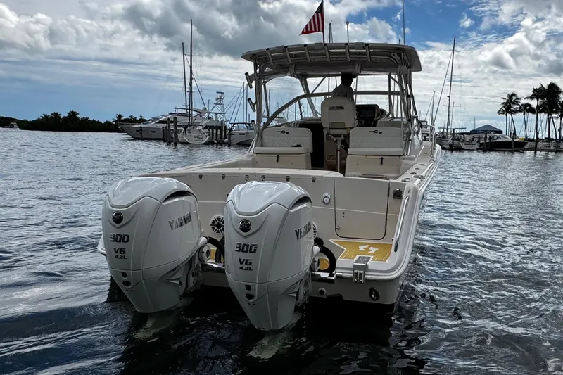  Yacht Photos Pics 2001 Grady-White Express 330 boat with twin Yamaha 300 V6 engines on water.