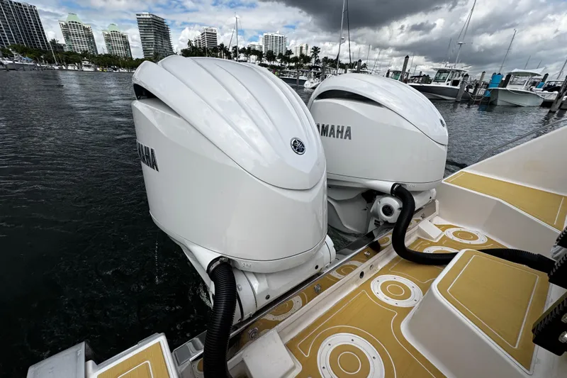  Yacht Photos Pics Twin Yamaha outboard engines on a 2001 Grady-White Express 330 boat at a marina.