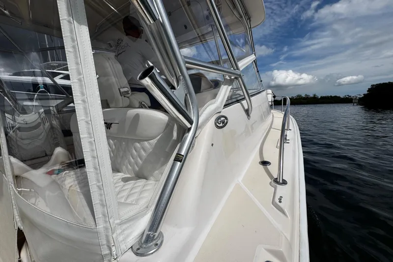  Yacht Photos Pics 2001 Grady-White Express 330 boat on water, featuring sleek design and white interior.