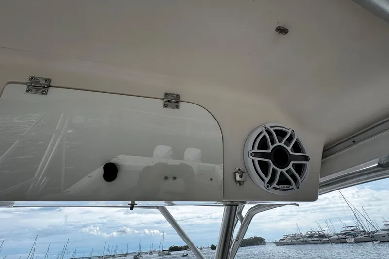  Yacht Photos Pics 2001 Grady-White Express 330 boat interior with speaker, marina view in background.