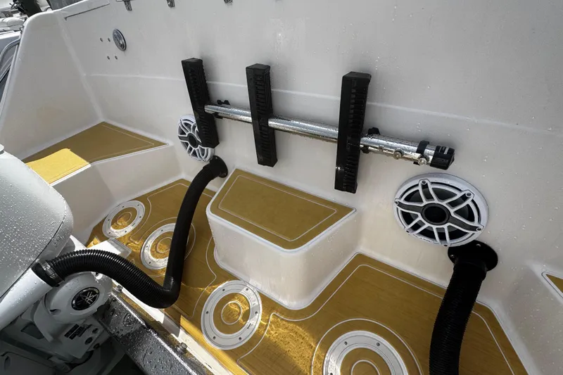  Yacht Photos Pics 2001 Grady-White Express 330 boat deck with speakers and rod holders.