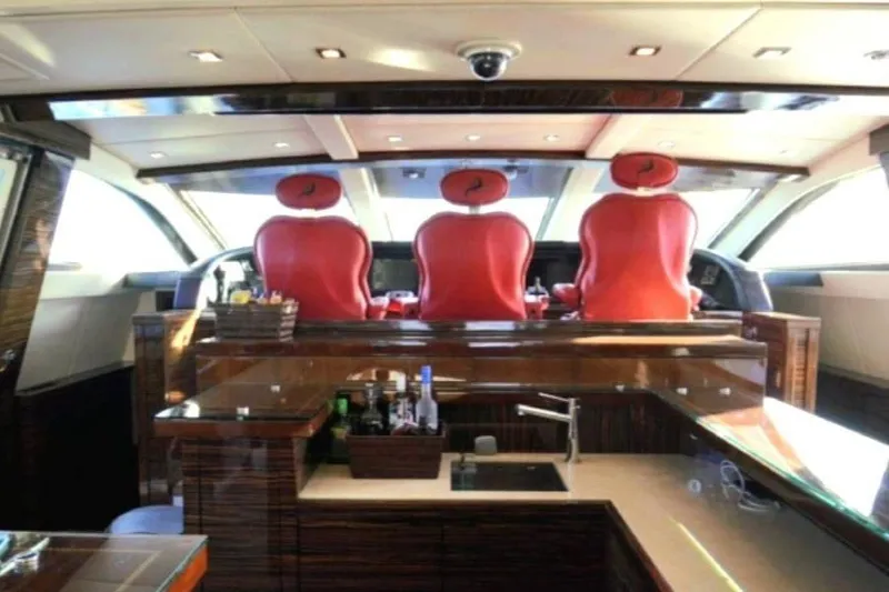  Yacht Photos Pics Luxurious 2008 Leopard 112 yacht interior with red seats and modern amenities.