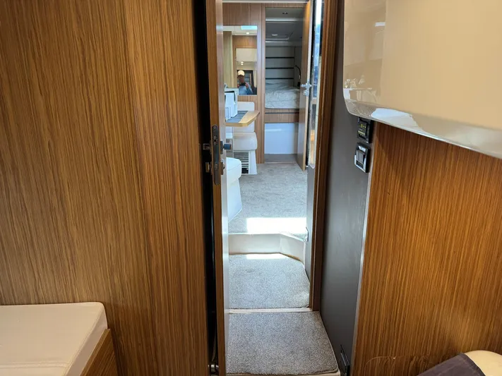 Onkor II Yacht Photos Pics Interior view of 2015 Azimut Atlantis 43 yacht, featuring wood paneling and modern design.