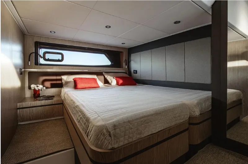 Onkor II Yacht Photos Pics Luxurious bedroom interior of 2015 Azimut Atlantis 43 yacht with modern design.