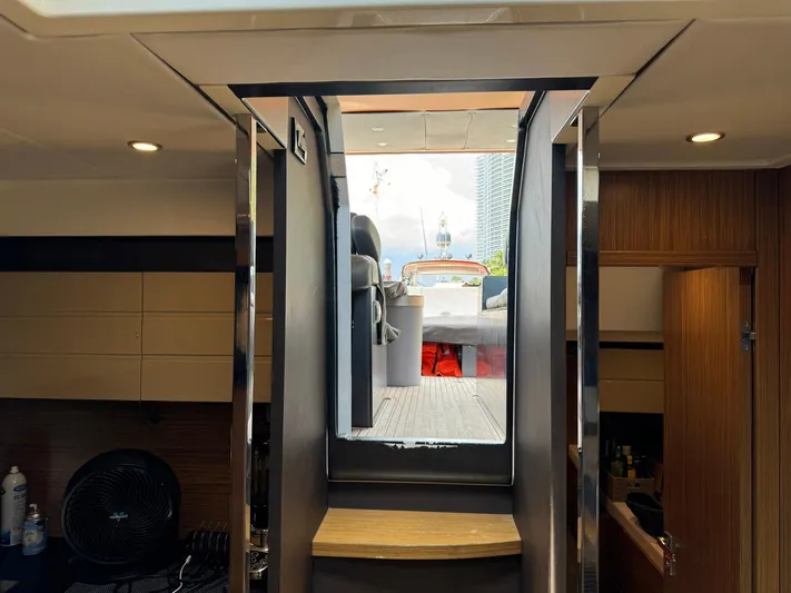 Onkor II Yacht Photos Pics Interior view of 2015 Azimut Atlantis 43 yacht, showing modern design and outdoor access.