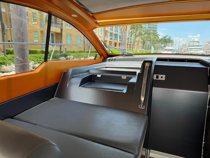 Onkor II Yacht Photos Pics Interior view of 2015 Azimut Atlantis 43 yacht with modern seating and large windows.