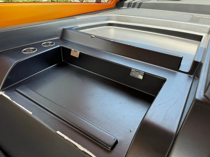 Onkor II Yacht Photos Pics 2015 Azimut Atlantis 43 boat interior detail with storage compartments and cup holders.