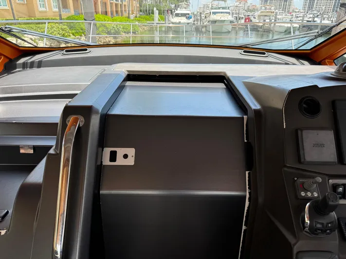 Onkor II Yacht Photos Pics Interior dashboard of a 2015 Azimut Atlantis 43 yacht, featuring modern controls and sleek design.