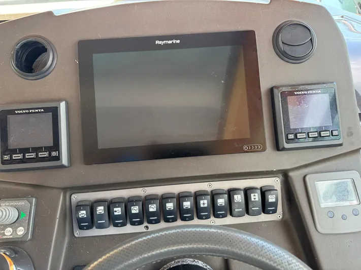 Onkor II Yacht Photos Pics Control panel of a 2015 Azimut Atlantis 43 yacht with Raymarine display.
