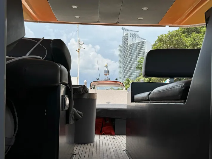 Onkor II Yacht Photos Pics Interior view of 2015 Azimut Atlantis 43 yacht with cityscape background.