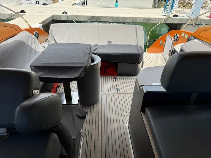 Onkor II Yacht Photos Pics Azimut Atlantis 43 yacht interior, 2015 model, featuring sleek seating and modern design.