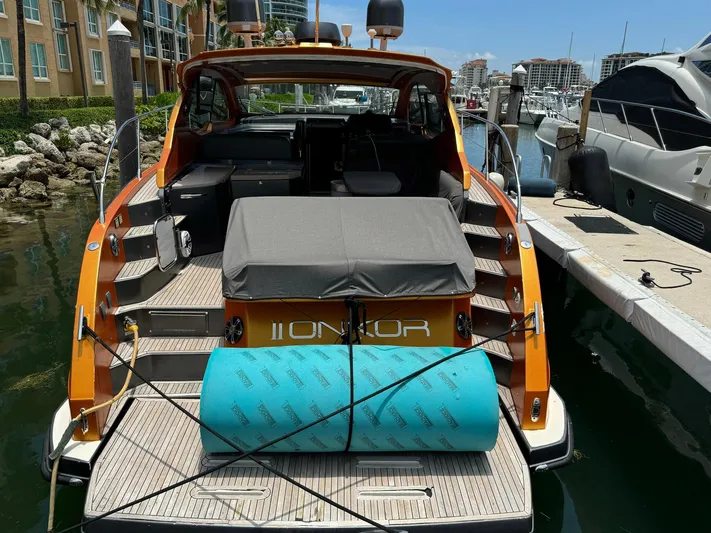 Onkor II Yacht Photos Pics Azimut Atlantis 43 yacht, 2015 model, docked with visible deck and seating area.