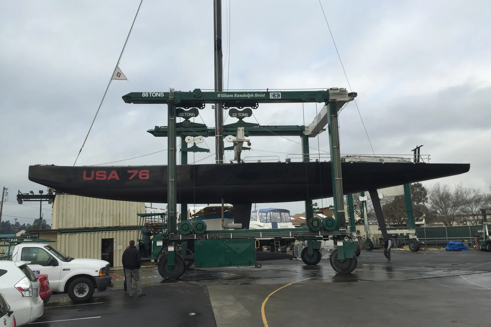 Sailboat "USA 76" lifted by crane, Custom International Americas Cup Class, 2002 model.