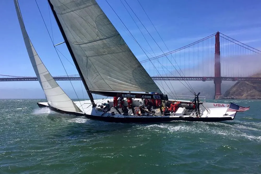 Sailing yacht in San Francisco Bay near Golden Gate Bridge, 2002 International Americas Cup Class.