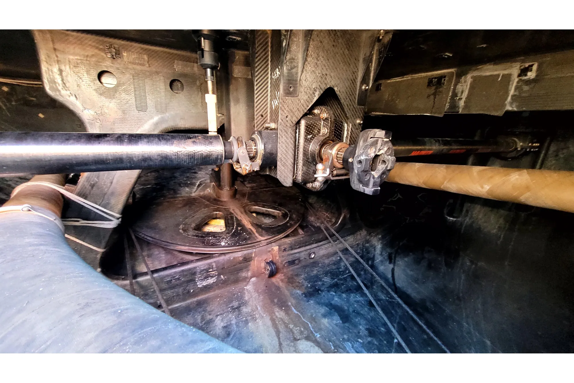 Interior view of a 2002 Custom International Americas Cup Class yacht, showcasing mechanical components.