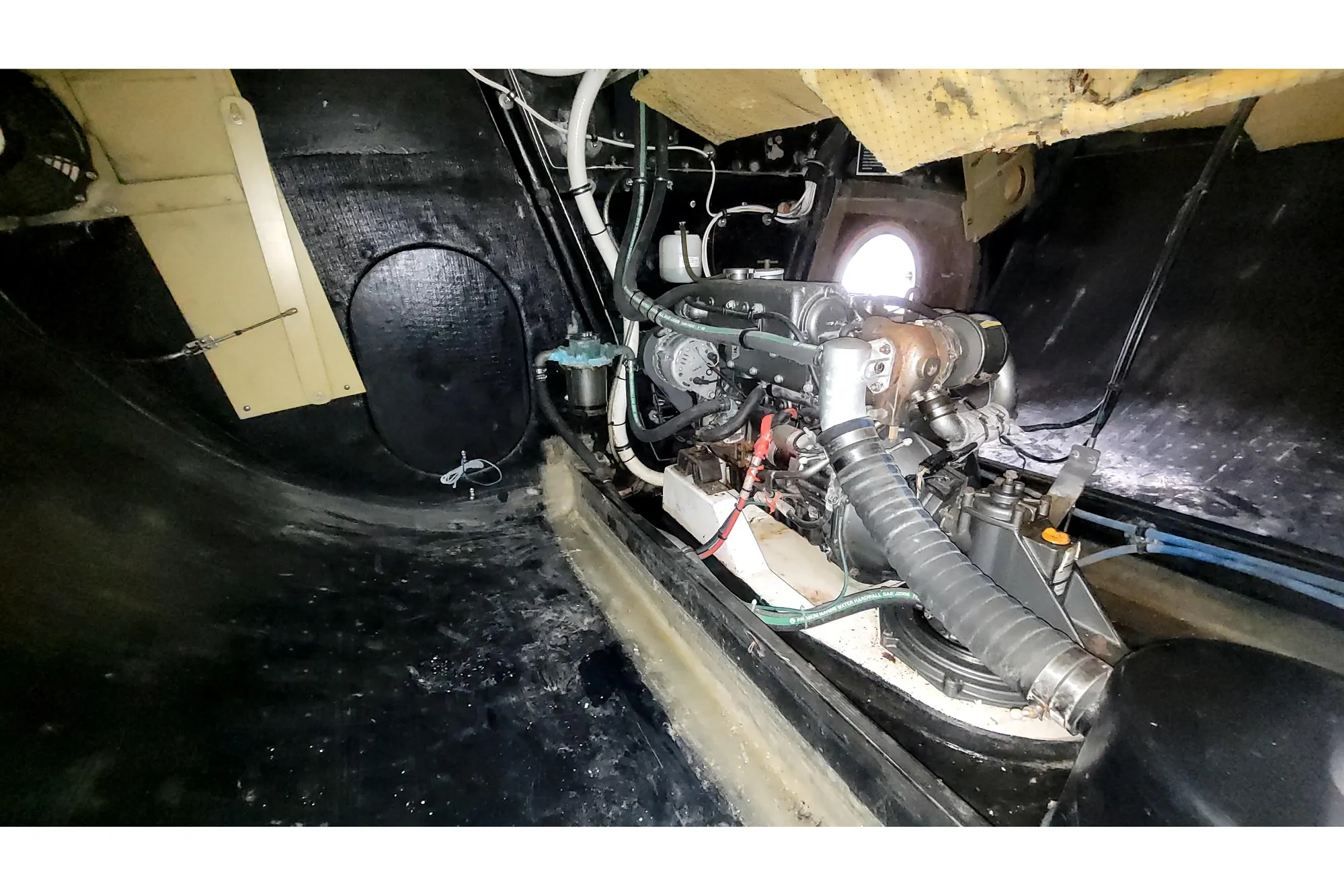 Interior view of a 2002 Custom International Americas Cup Class yacht engine room.